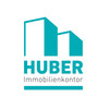 Huber Immobilienkontor Logo mit zwei blauen Häusern
