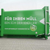 Großer grüner Müllcontainer