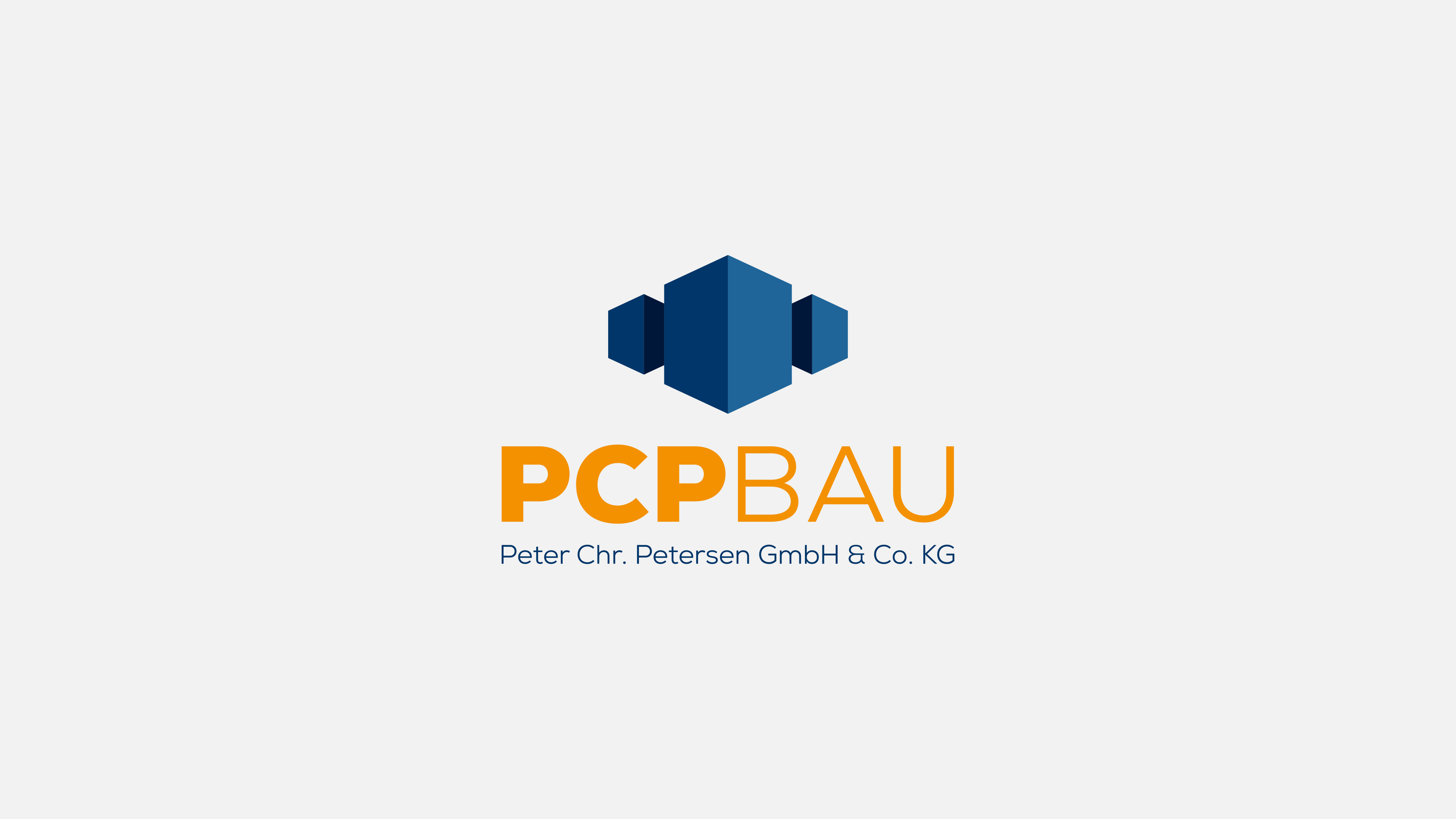 PCP Bau Logo in orangenen und blauen Farben