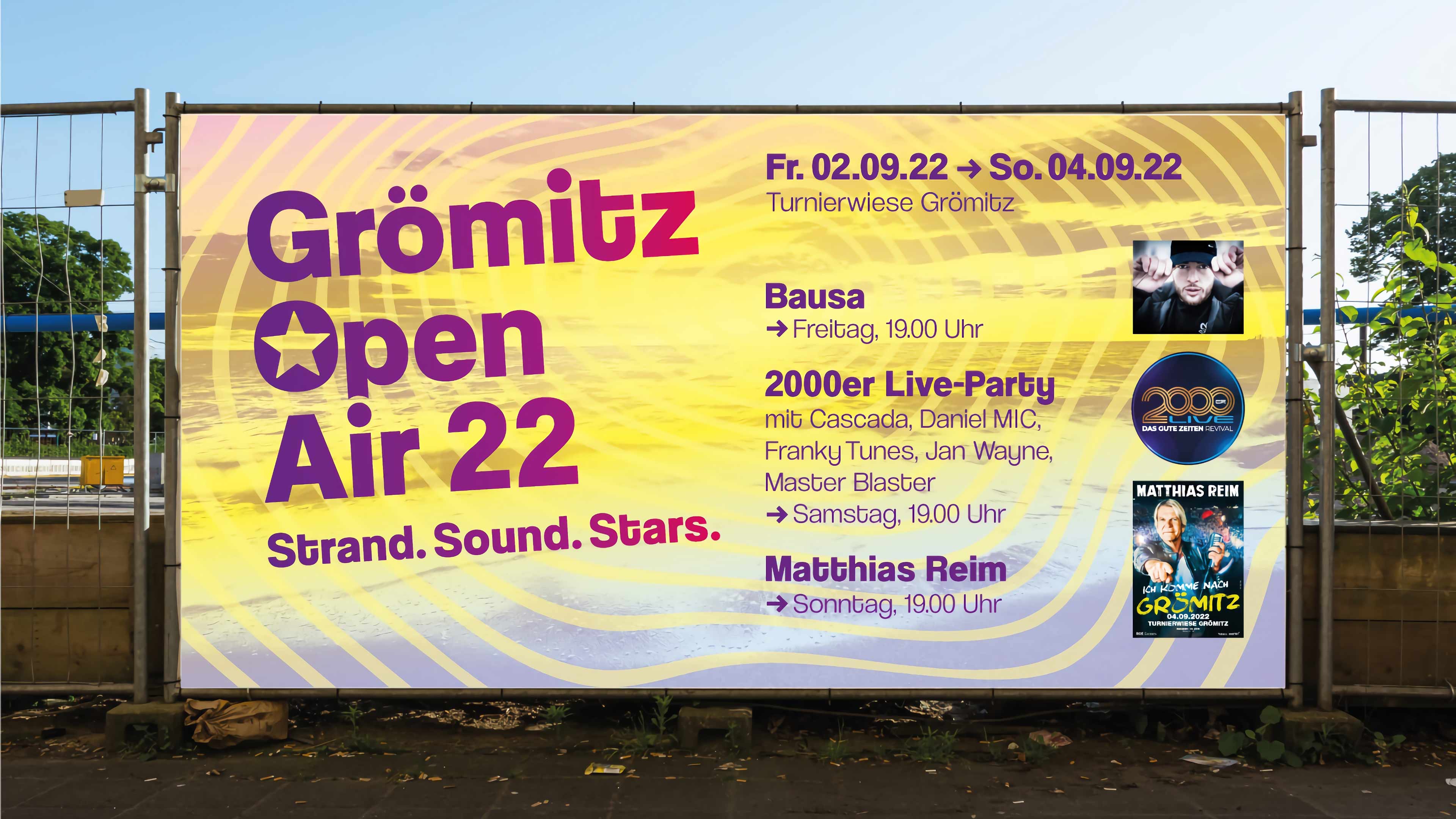 Bauzaun mit Werbung und Auftrittsdaten für Grömitz Open Air 22