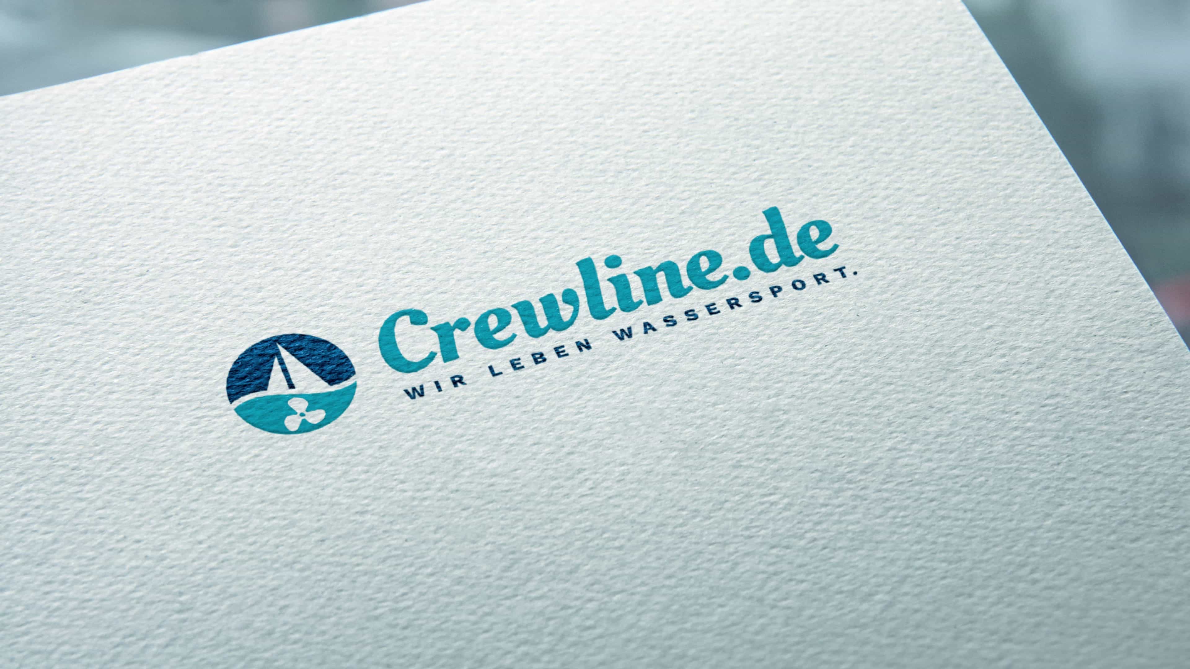 Geschäftspapier mit türkis-blauem Logo Crewline.de