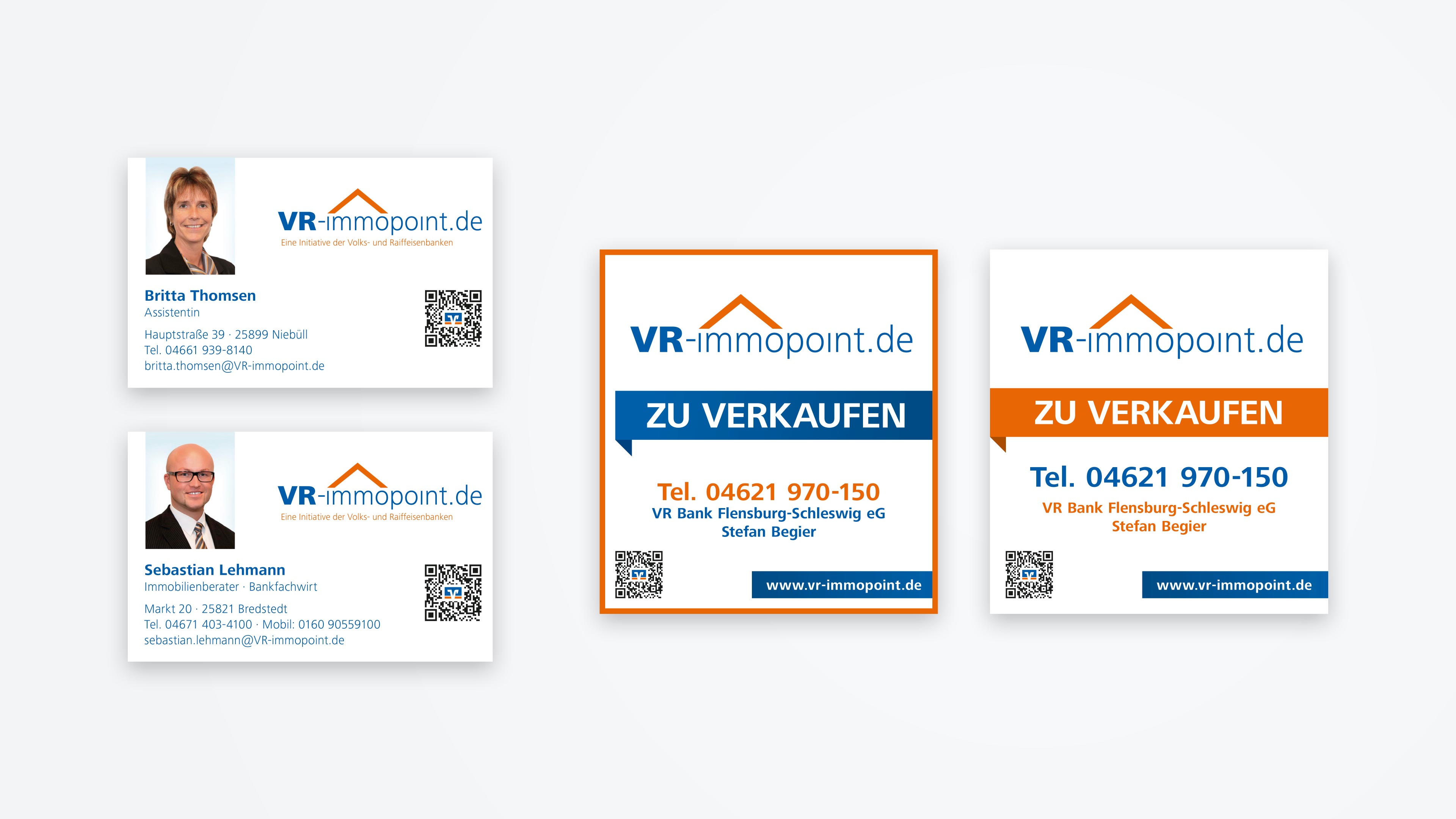 Zwei Visitenkarten der VR Bank Flensburg