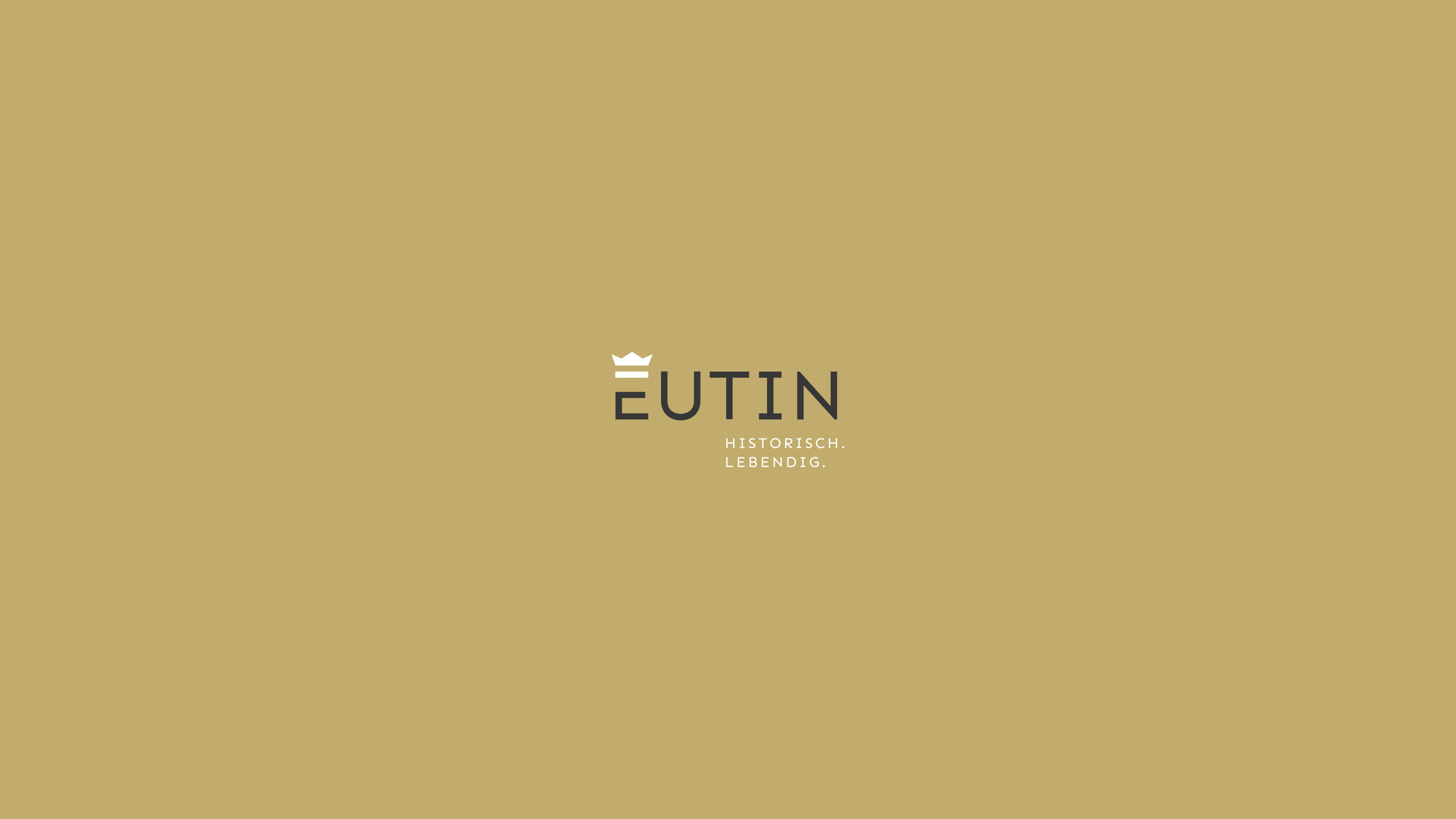 Goldener Hintergrund und Eutin-Logo mit Text "Historisch. Lebendig"