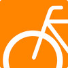 Ein weißes Rennrad auf orangenem Hintergrund