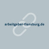 Blauer Schriftzug arbeitgeber-flensburg.de auf grauem Hintergrund
