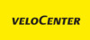 Gelbes Logo mit dunklen Buchstaben von VeloCenter