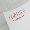 Das neue Logo von Nørre Trading ApS auf Briefpapier.