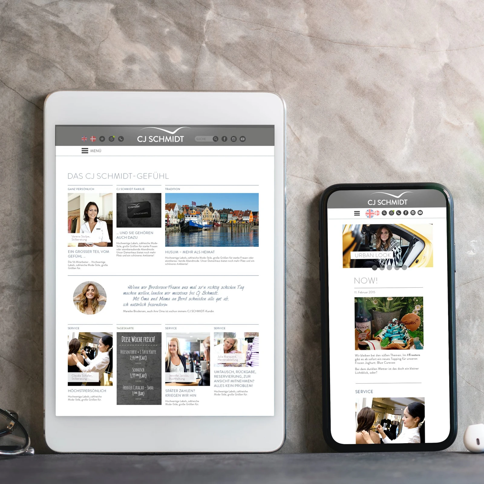 Liegendes Tablet und Smartphone, das die mobile Seite von CJ Schmidt zeigt