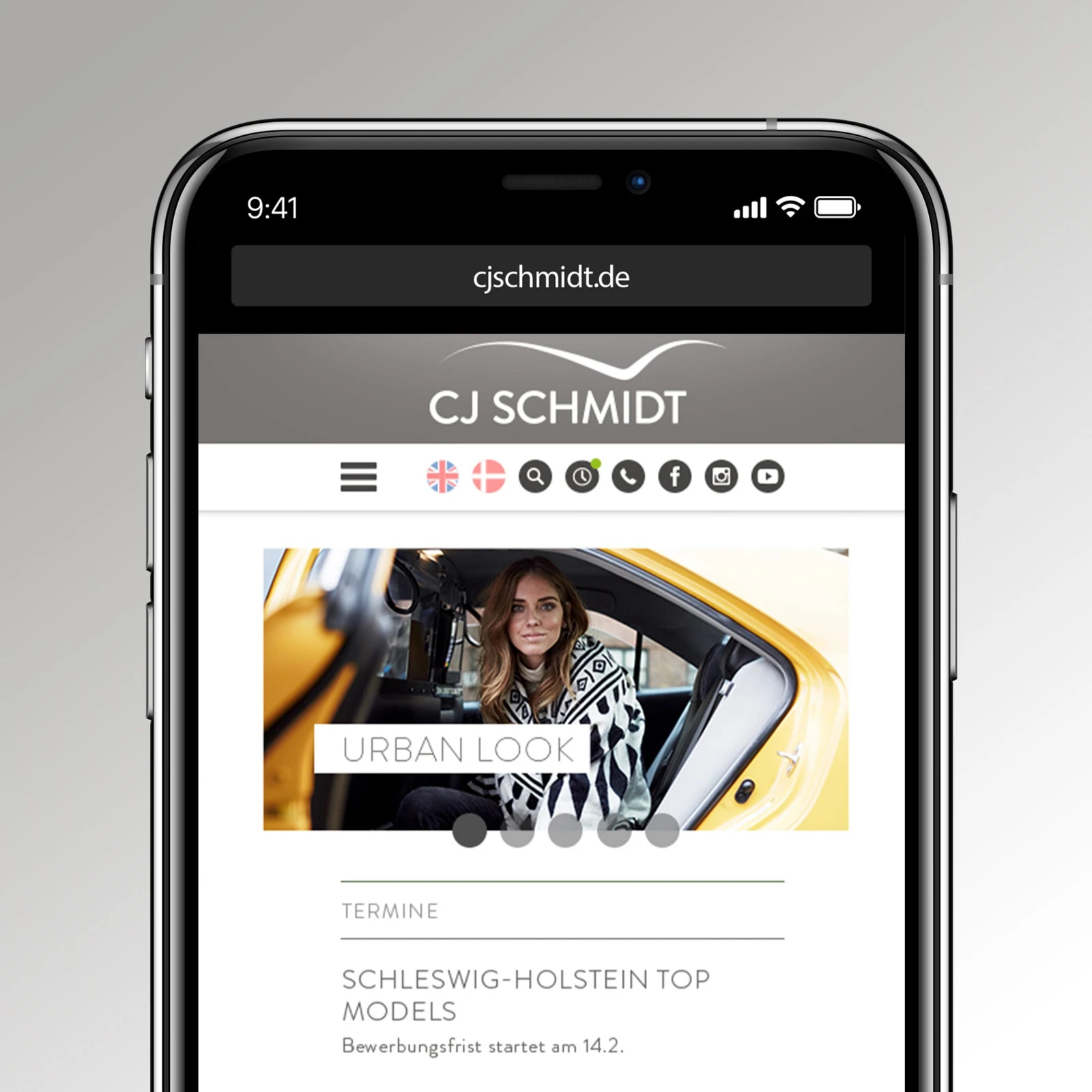 Oberer Teil eines Smartphones, das die mobile Seite von CJ Schmidt zeigt