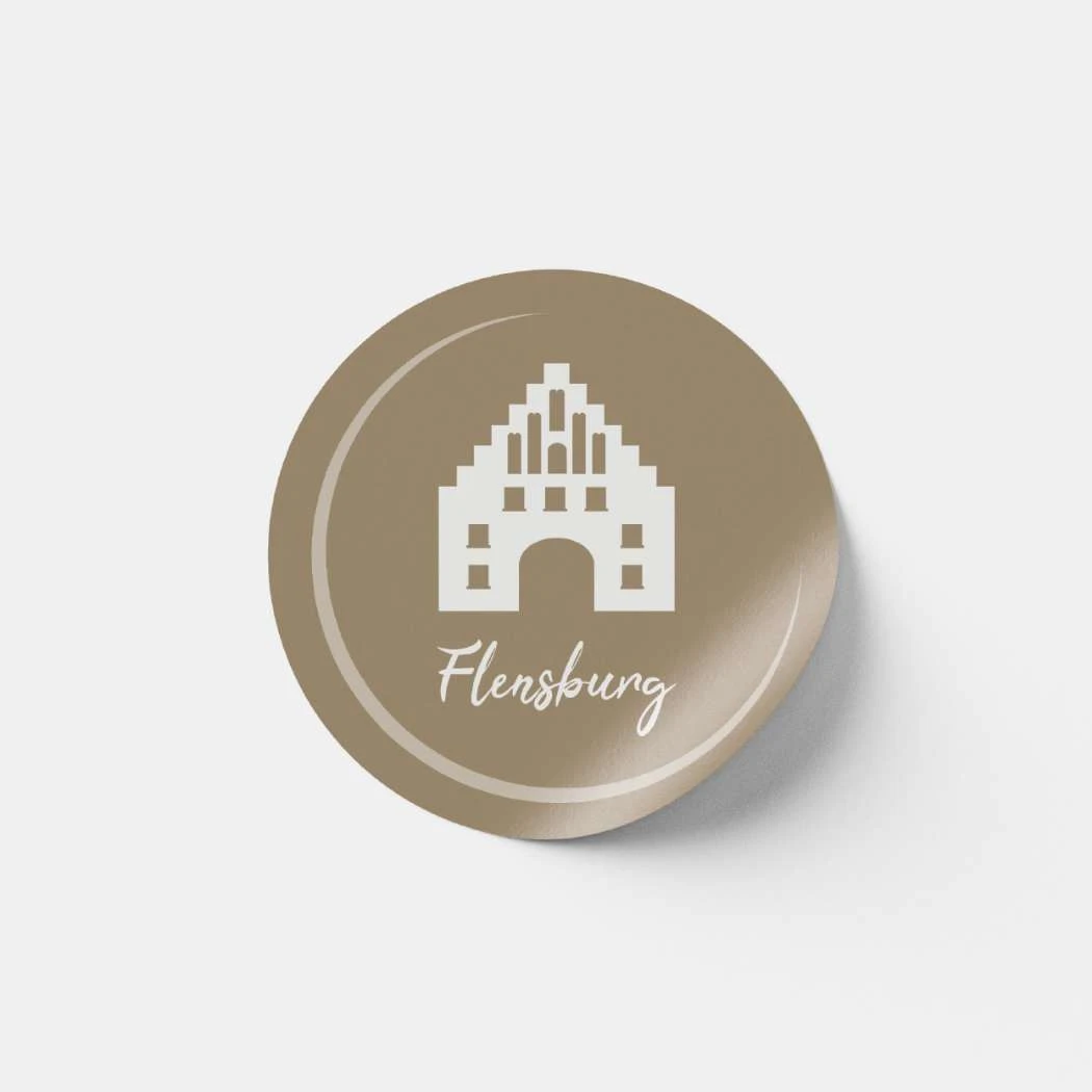 Ein Button mit dem Nordertor