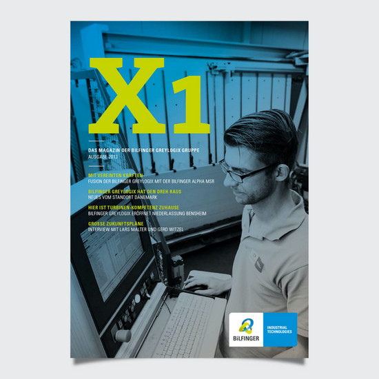 Titelblatt des Firmenmagazin X1 zeigt Mann an einer Maschine