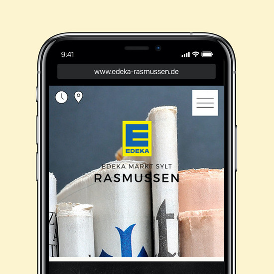Smartphone zeigt Website edeka-rasmussen.de 