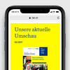 Smartphone zeigt gelbe Website des FAB 
