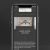 Smartphone zeigt Website des Hotel Conventgarten über Online-Buchung vor grauem Hintergrund