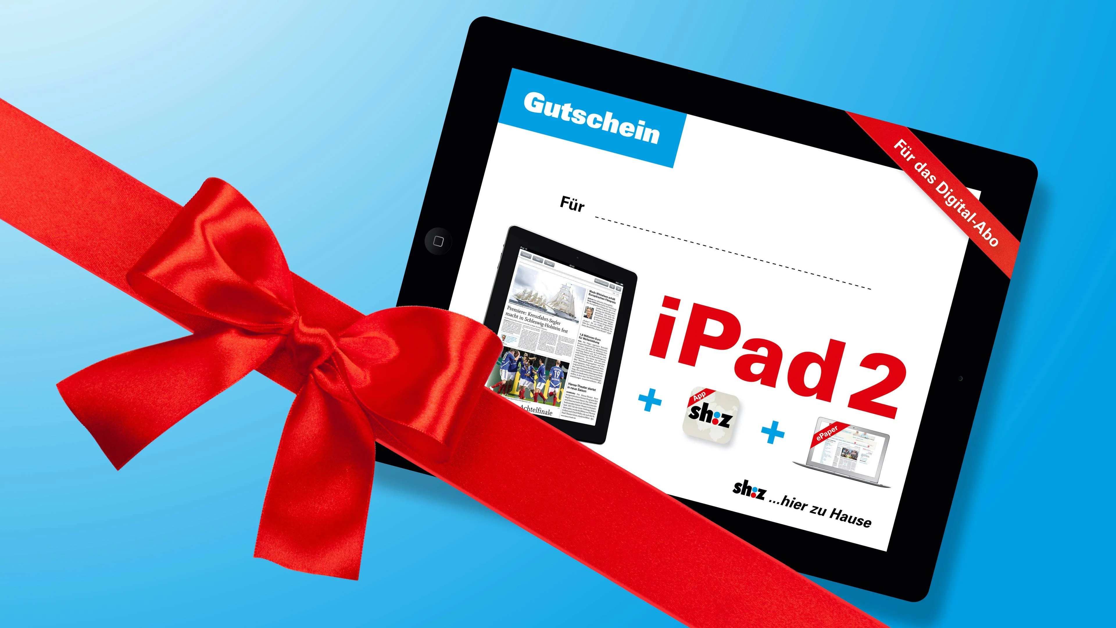 Schwarzes Ipad mit rotem geschenkband