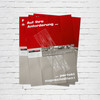 Drei rot-beige Broschüren der anthon GmbH vor weißer Ziegelwand