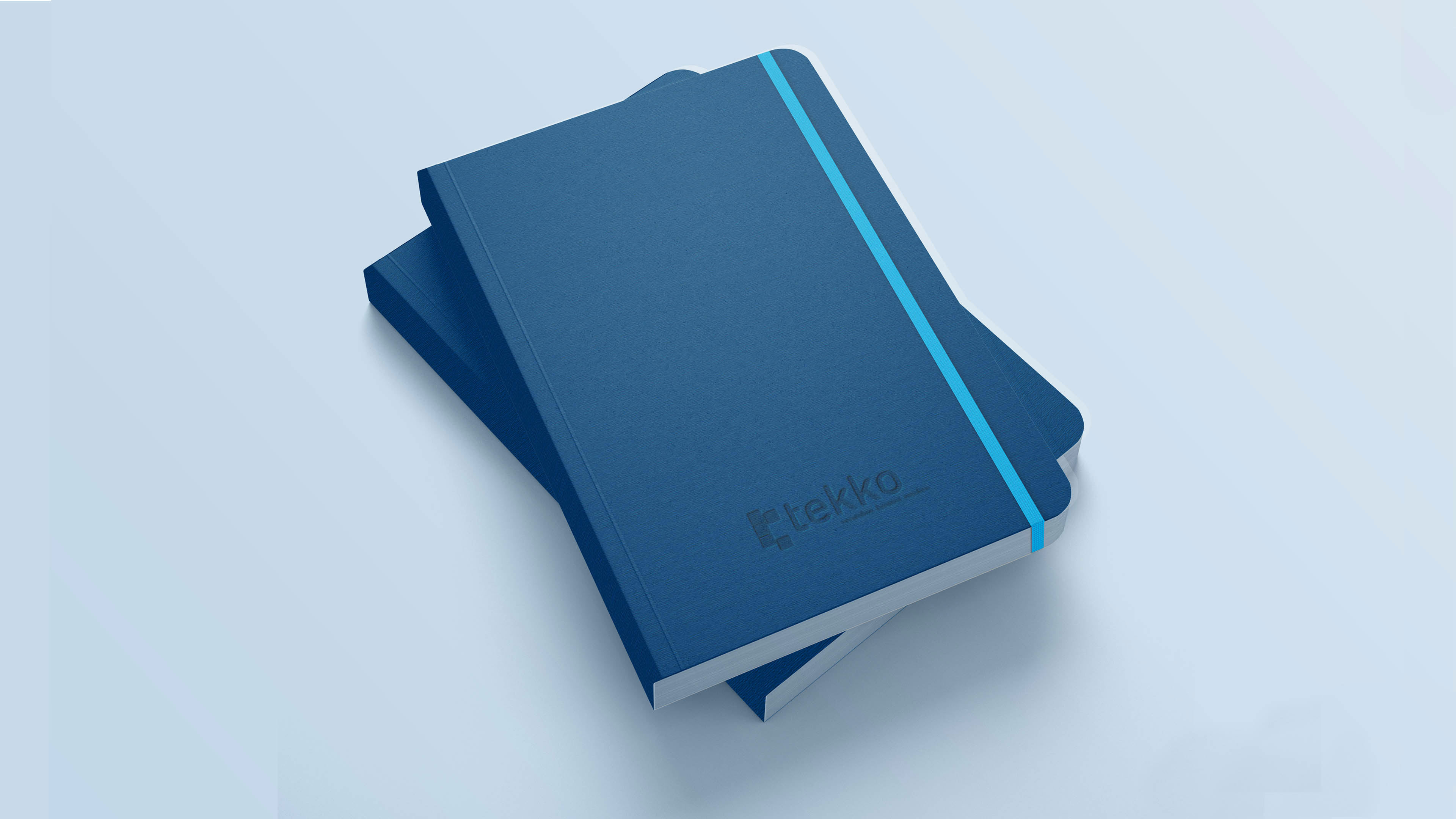 Blaues Notizbuch mit türkisen Gummi