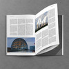 Aufgeklapptes Heft mit einem Bild von dem deutschen Bundestag